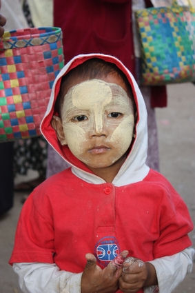 Child painted with Thanakha